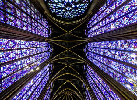 Paris, France-14 January, 2018: View interior of the famous Saint Chapelle, details of beautiful glass mosaic windows. Holy Chapel is a one of the most beautiful and tourist visited landmarkのeditorial素材