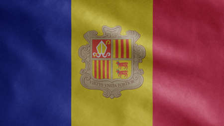 Andorran flag waving in the wind. Close up of Andorra banner blowing, soft and smooth silk. Cloth fabric texture ensign background. Use it for national day and country occasions concept.の写真素材