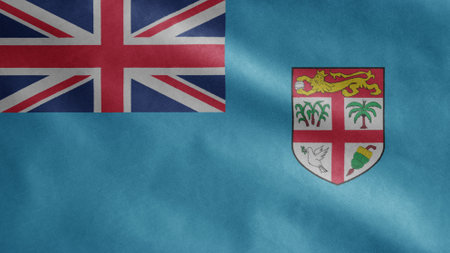 Fijian flag waving in the wind. Close up of Fiji banner blowing, soft and smooth silk. Cloth fabric...