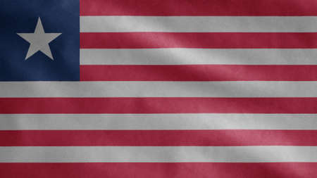 Liberian flag waving in the wind. Close up of Liberia banner blowing, soft and smooth silk. Cloth...