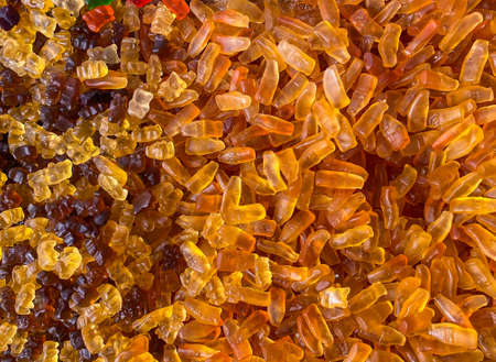 Delicious jelly bottles. Closeup a background from colorful sweets of sugar candies. Assortment...