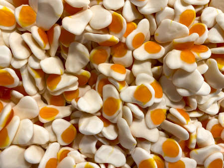 Delicious jelly fried eggs. Closeup a background from colorful sweets of sugar candies. Assortment...