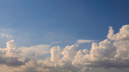 Cumulus clouds with blue sky on a sunny day of summer. Beautiful cloudscape as nature background...