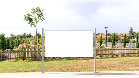 Blank square sign mockup in the urban environment on the street, empty space to display your store sign or logo. Mock-up on white background for the design of advertisements.の写真素材