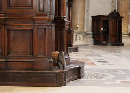 Prayer kneeling in confession.の写真素材