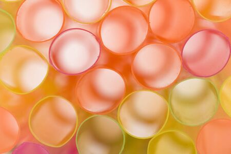 Cluster of colorful straws in close up view. Soft focus. Abstract background.の写真素材