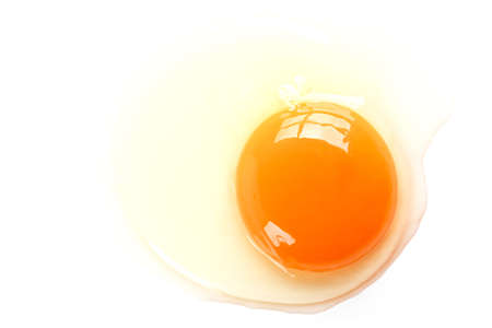 Egg yolk isolated on a white background.