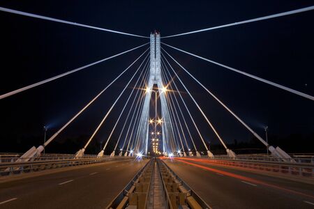 Night view of the new Swietokrzyski (Syrena) Bridge in Warsaw.の写真素材