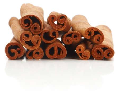 Cinnamon sticks spice isolated over white background の写真素材
