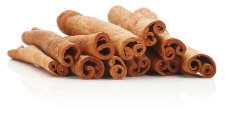 Cinnamon sticks spice isolated over white background 