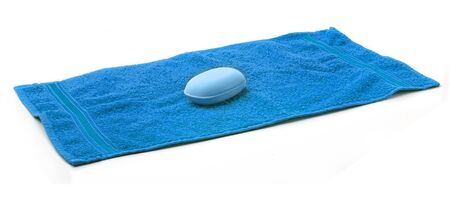 Blue Towel with bar of blue Soap の写真素材