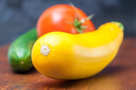 Selection of fresh vegetables on wooden background.の写真素材