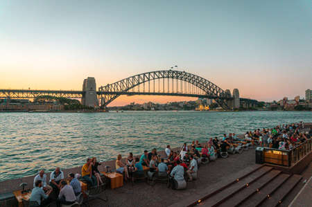 Sydney Harbour Bridge and Opera House during sunsetの写真素材