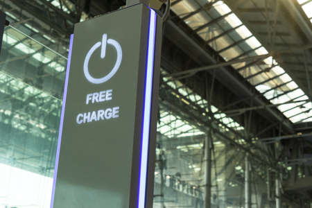 Sign of free charge spot for handheld devices in an airport.の写真素材