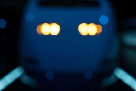 Bokeh of high-speed train's locomotive's headlight.の写真素材