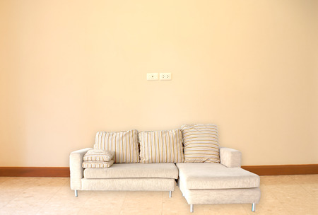  sofa on floor and wallpaper  background in room の写真素材