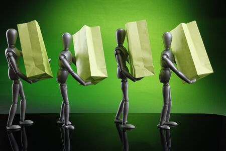 Silver dummies carrying gift bagsの写真素材