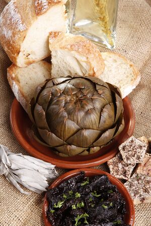 Steamed artichoke and sun dried tomato vinagretteの写真素材