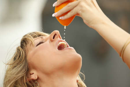 It takes an orange squeeze to quench the thirstの写真素材