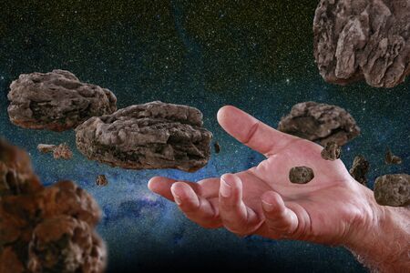 Asteroids at handの写真素材