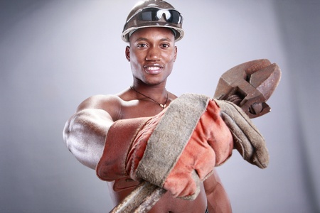 Muscular African American iron workerの写真素材
