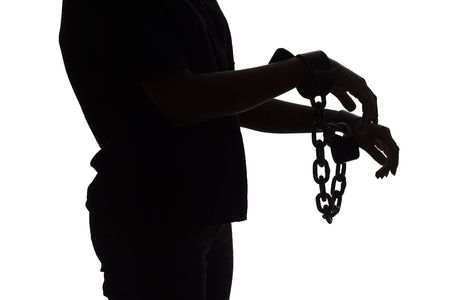 isolated on white silhouette of woman with chainsの写真素材