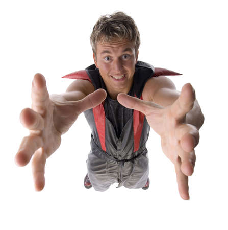 Headshot of man wearing strange costume reaching something. Wide angle. Isolated on white, in studio.の写真素材