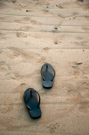 Sandals on on of the beautiful beaches on Koh Lanta island, Krabi, Thailandの写真素材