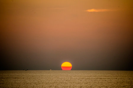 Sunset on the sea. Beautiful sunset on the sea. Sunset on the sea, Kalim Bay, Phuket, Thailandの写真素材
