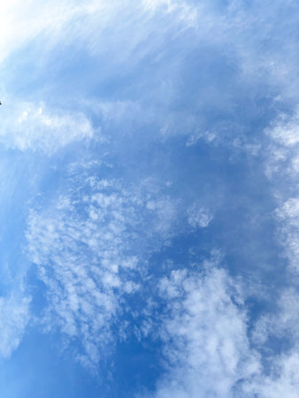 Blue sky background with tiny clouds. Blue sky with tiny clouds.
