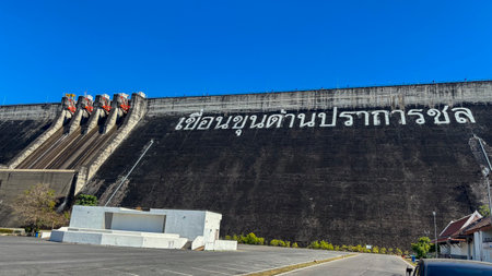 Dam wall with the name of the dam, Khun Dan Prakarnchon Dam Reservoir and Scenic View in Nakhon Nayok, Thailandの写真素材
