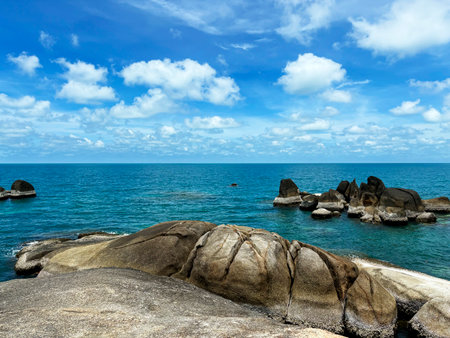 Beautiful seascape with granite rocks on the seashore, Hin Ta Hin Yai Rock Formations in Koh Samui, Thailandの写真素材