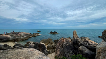 Beautiful seascape with rocks and blue sky, Hin Ta Hin Yai Rock Formations in Koh Samui, Thailandの写真素材