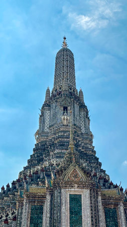 Wat Arun is a Buddhist temple in Bangkok, Thailand â Iconic Riverside Buddhist Temple with Ornate Architectureの写真素材