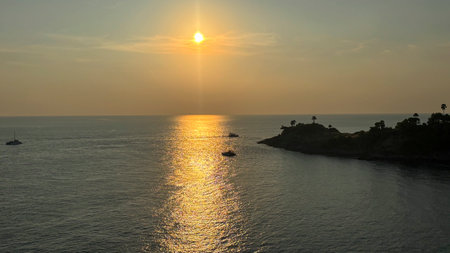 Beautiful sunset over the sea, Phromp Thep Cape, Phuket, Thailandの写真素材