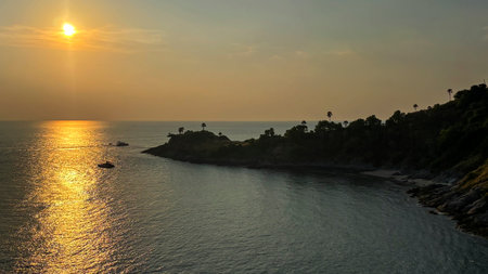 Sunset at the coast of Phromp Thep Cape, Phuket, Thailand