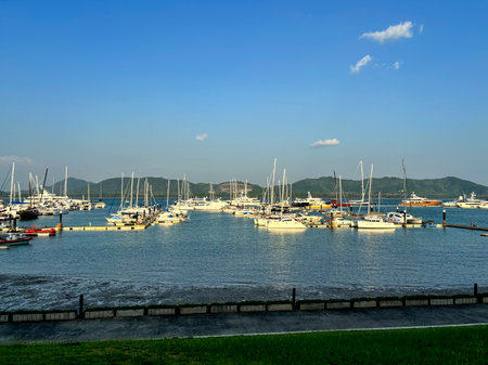 Sailboats and yachts moored in the marina