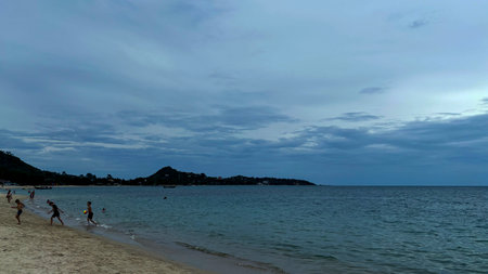 Tourists Enjoying the Beach at Lamai, Koh Samui, Thailand