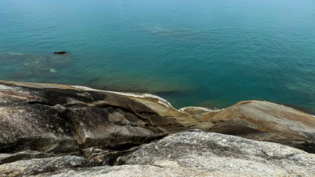 Scenic Rocky Coastline Overlooking the Sea at Lat Ko Viewpoint, Koh Samuiの写真素材
