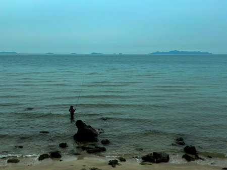 Fisherman on Taling Ngam Beach in the evening, Koh Samui, Thailandの写真素材