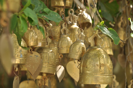Bells in a temple in the south of Thailand, closeup of photo