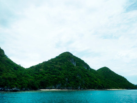 Beautiful seascape with green mountains and blue sky at Ang Thong National Marine Park, Koh Samui, Thailandの写真素材