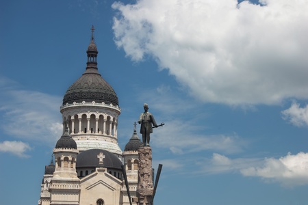 Orthodox Christian Byzantine style church with blue sky and clouds in Cluj Napocaの写真素材