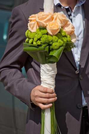 wedding scene best man with decorated wedding candleの写真素材