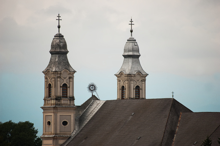 general view of the Holy Trinity catholic church from Sumuleu Romaniaの写真素材