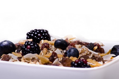 healthy breakfast meal with cereals and cultivated berriesの写真素材