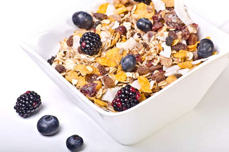healthy breakfast meal with cereals and cultivated berriesの写真素材