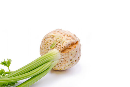 fresh celery with beautiful green leaves isolated on whiteの写真素材