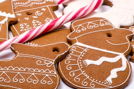 gingerbread figurines with beautiful details from white sugarの写真素材