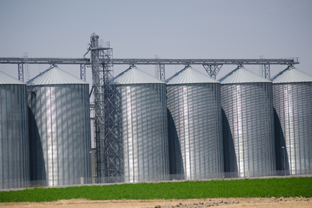 grain metal silver silo in the industry of agricultureの写真素材